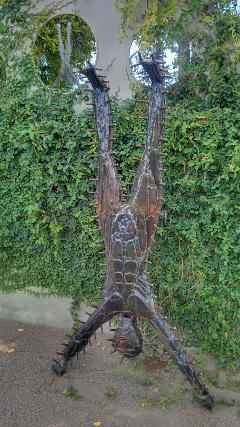 Sculpture of man doing a handstand - at 2350 Elm Street, Tucson, Arizona